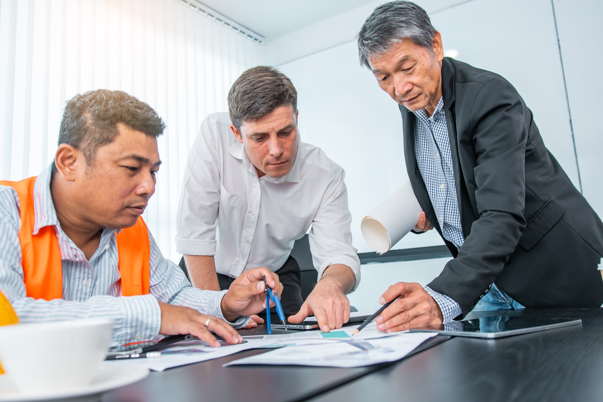 Business people team work while working in board