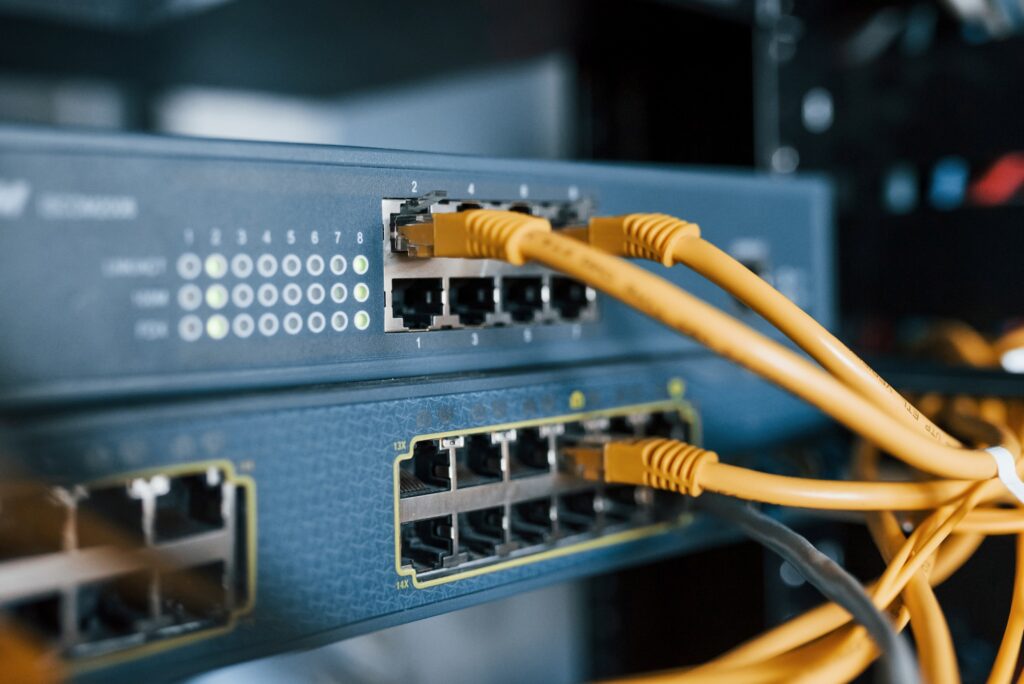 Close up view of internet equipment and cables in