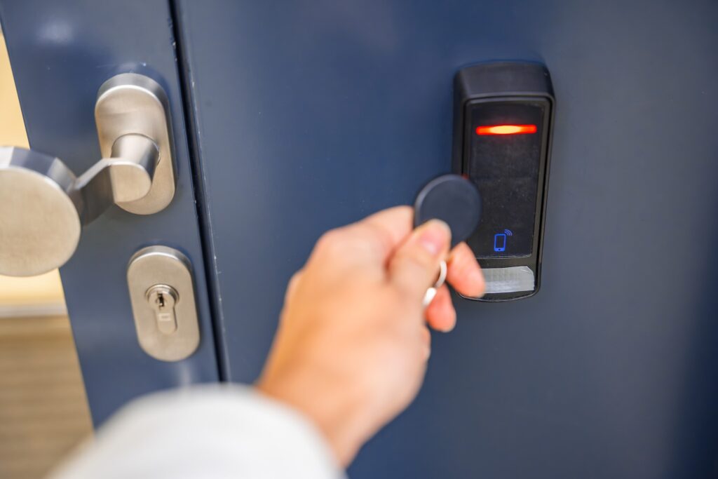 Close up view of person using a electric lock key