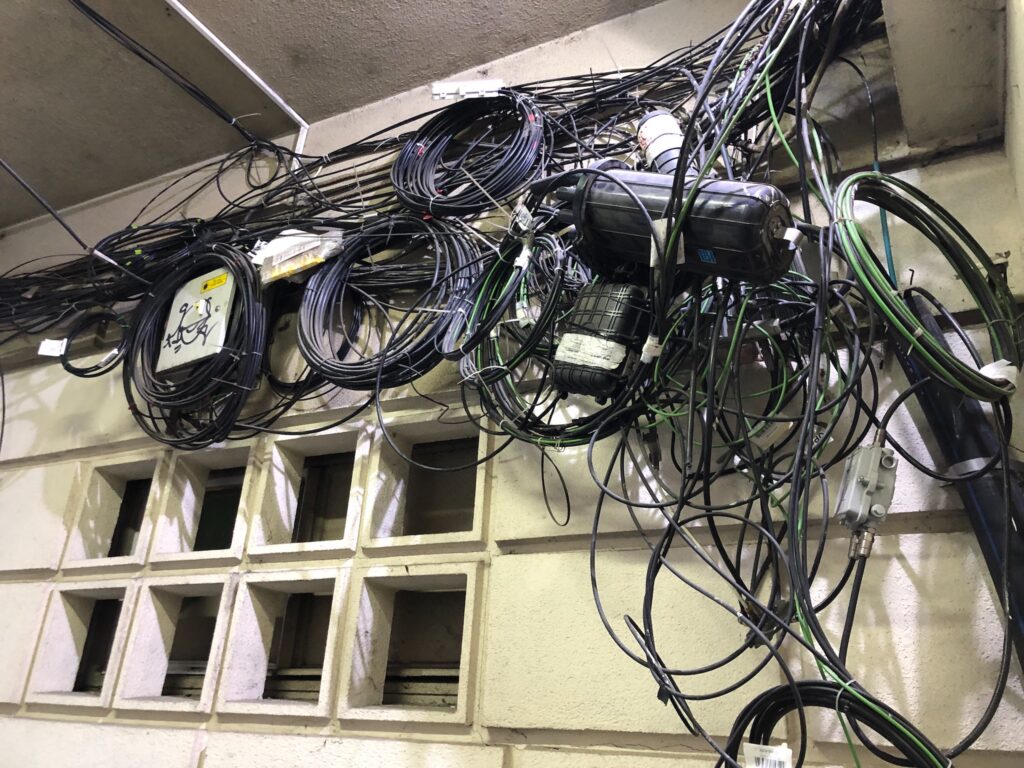 Tangled situation concept with many electric wires